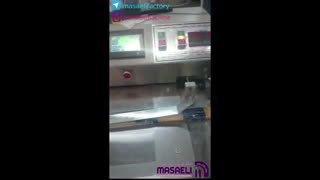 دستگاه بسته بندی حلوا کنجدی